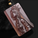 Angled view of the hand-carved purple agate Leo pendant showing the relief